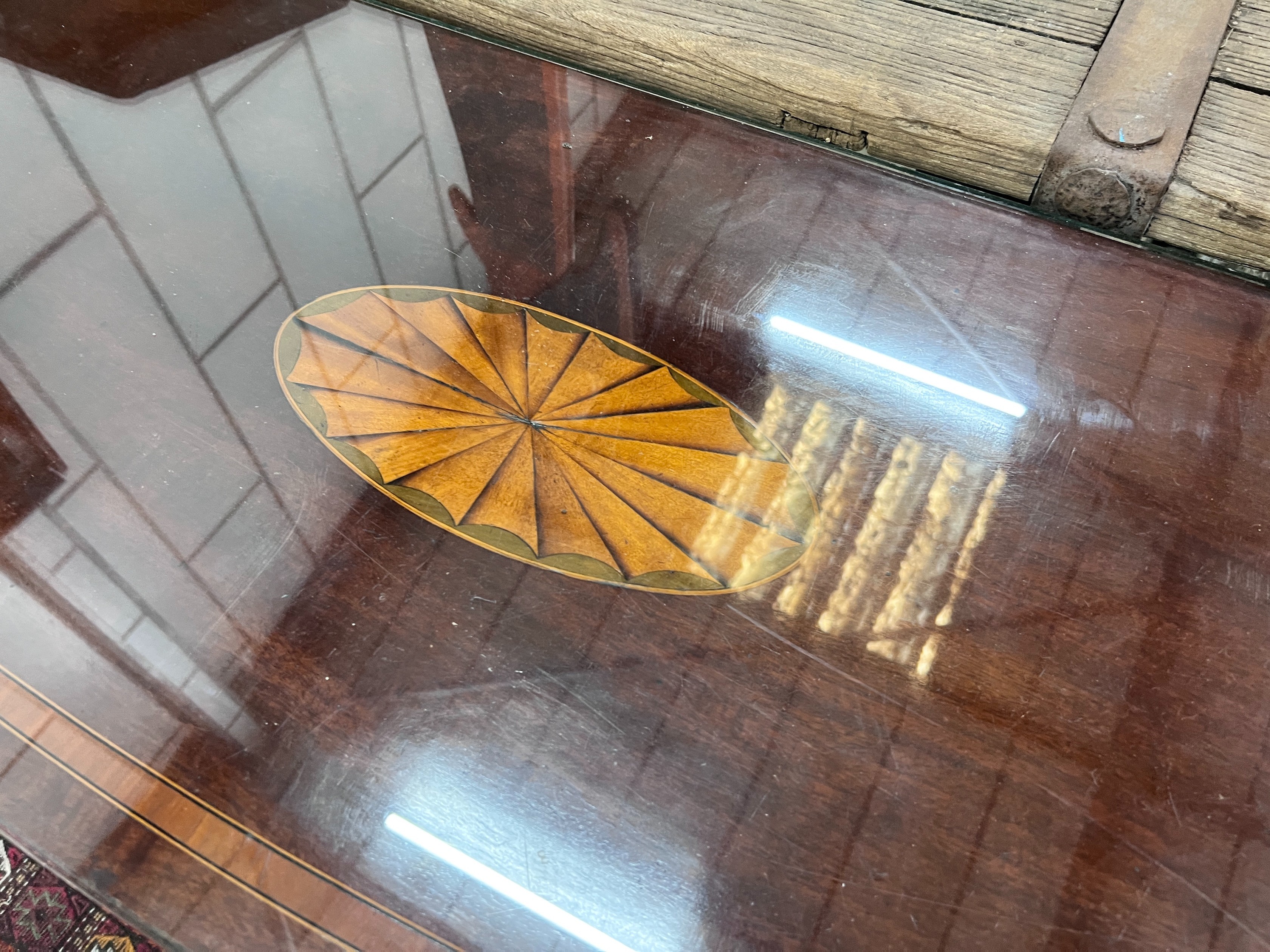 A George III inlaid mahogany bow front serving table, length 140cm, depth 47cm, height 84cm *Please note the sale commences at 9am.